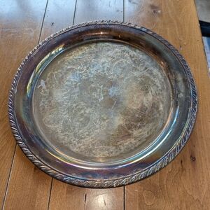 Silver Decorative Plate with Intricate Design